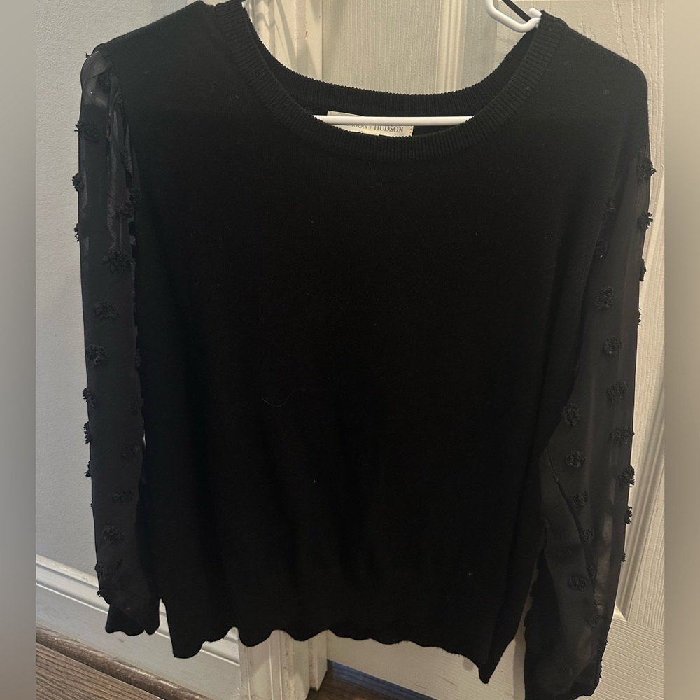 Black sweater with puffy polka dot sleeves
